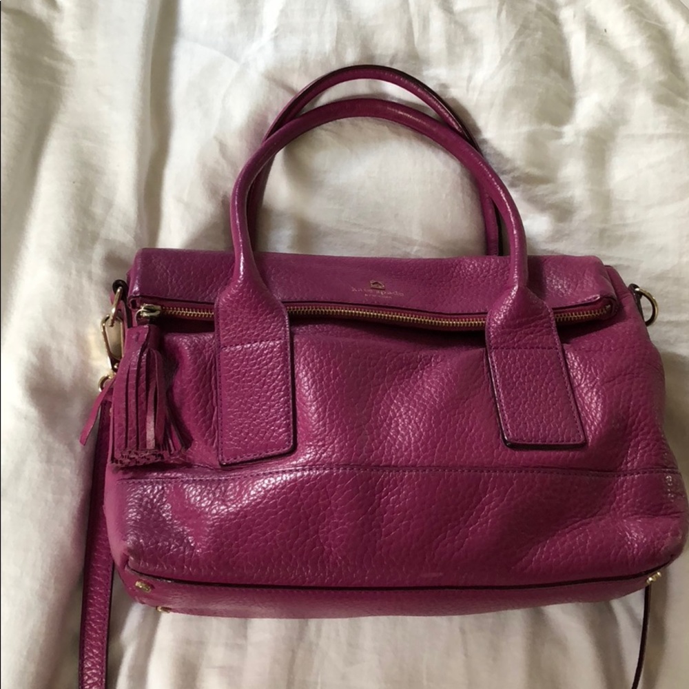 Kate Spade magenta leather purse with tassel